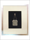 ngonya small silver ladies purse, framed with flat top silver frame, antique white mat board and black velvet