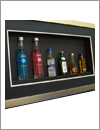 framed miniature whisky bottles